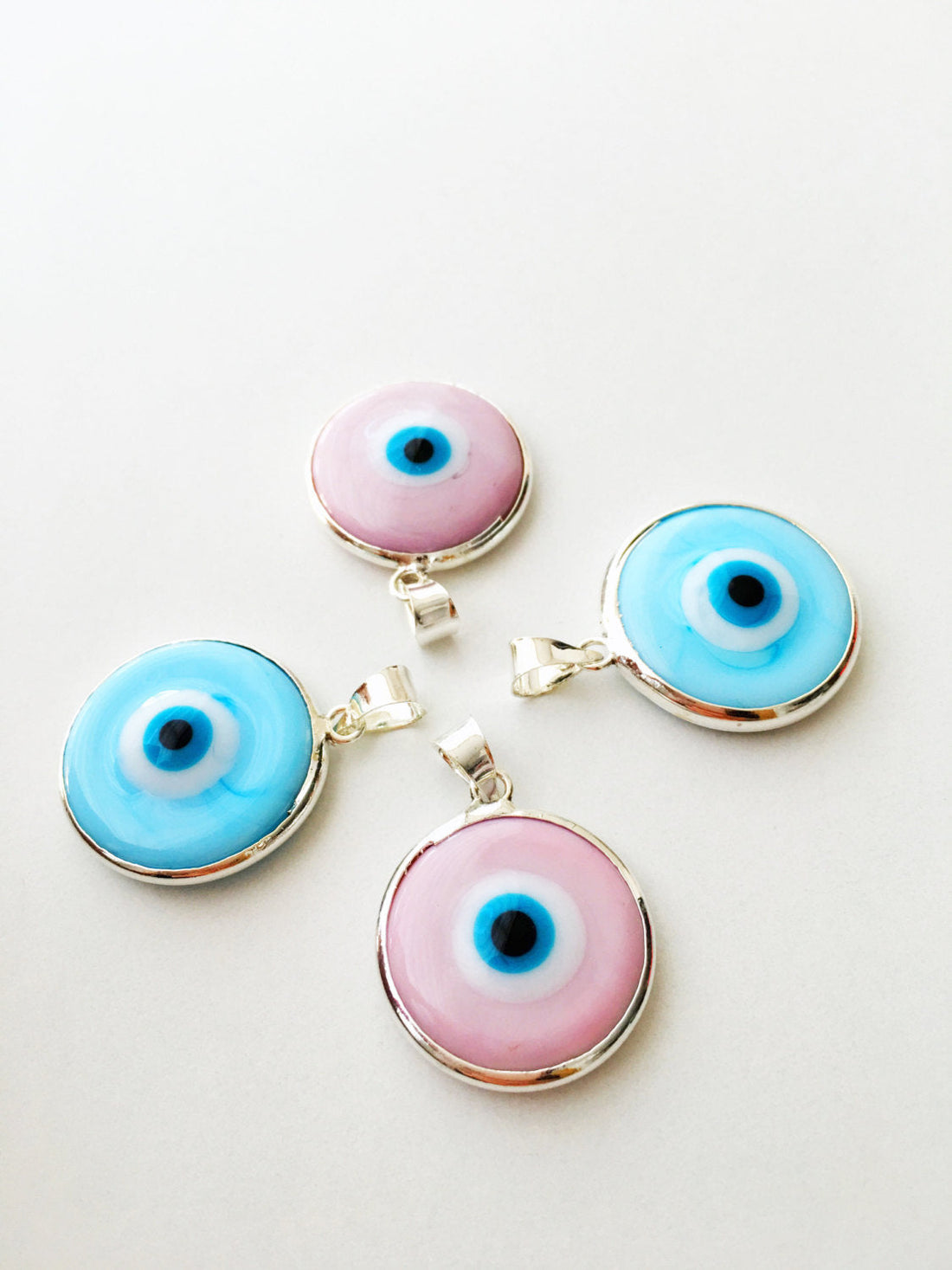 2pcs silver plated evil eye pendants, baby blue baby pink evil eye